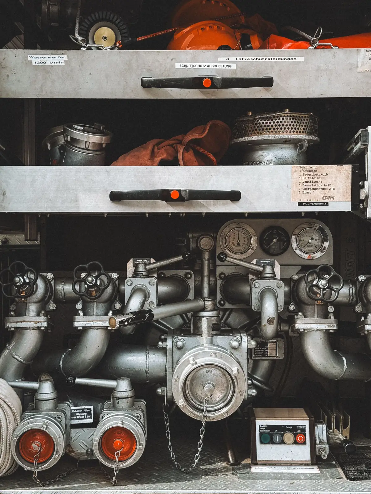 A pump panel with its gauges, valves and suction connections